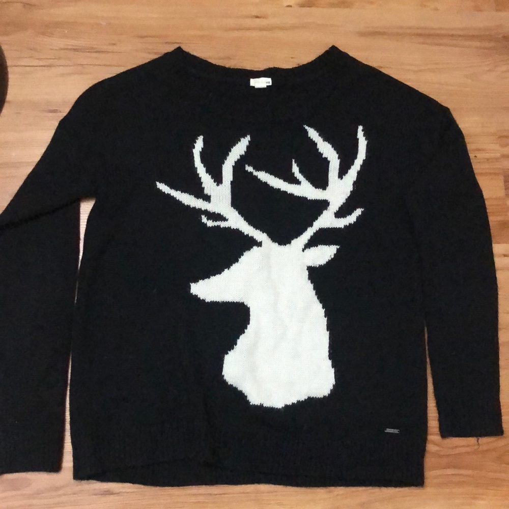 Cute winter Reindeer sweater form Garage